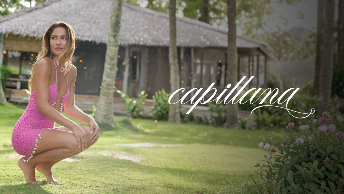 Woman in pink mini dress by outdoor pool perfect for beach styling guide featured image